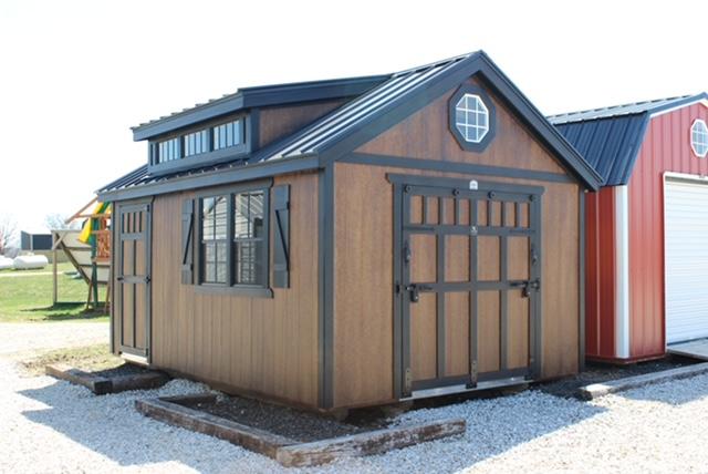 12x16 Garden Shed 12x16 Garden Shed with rampant door with two shed windows with shutters and transom dormer