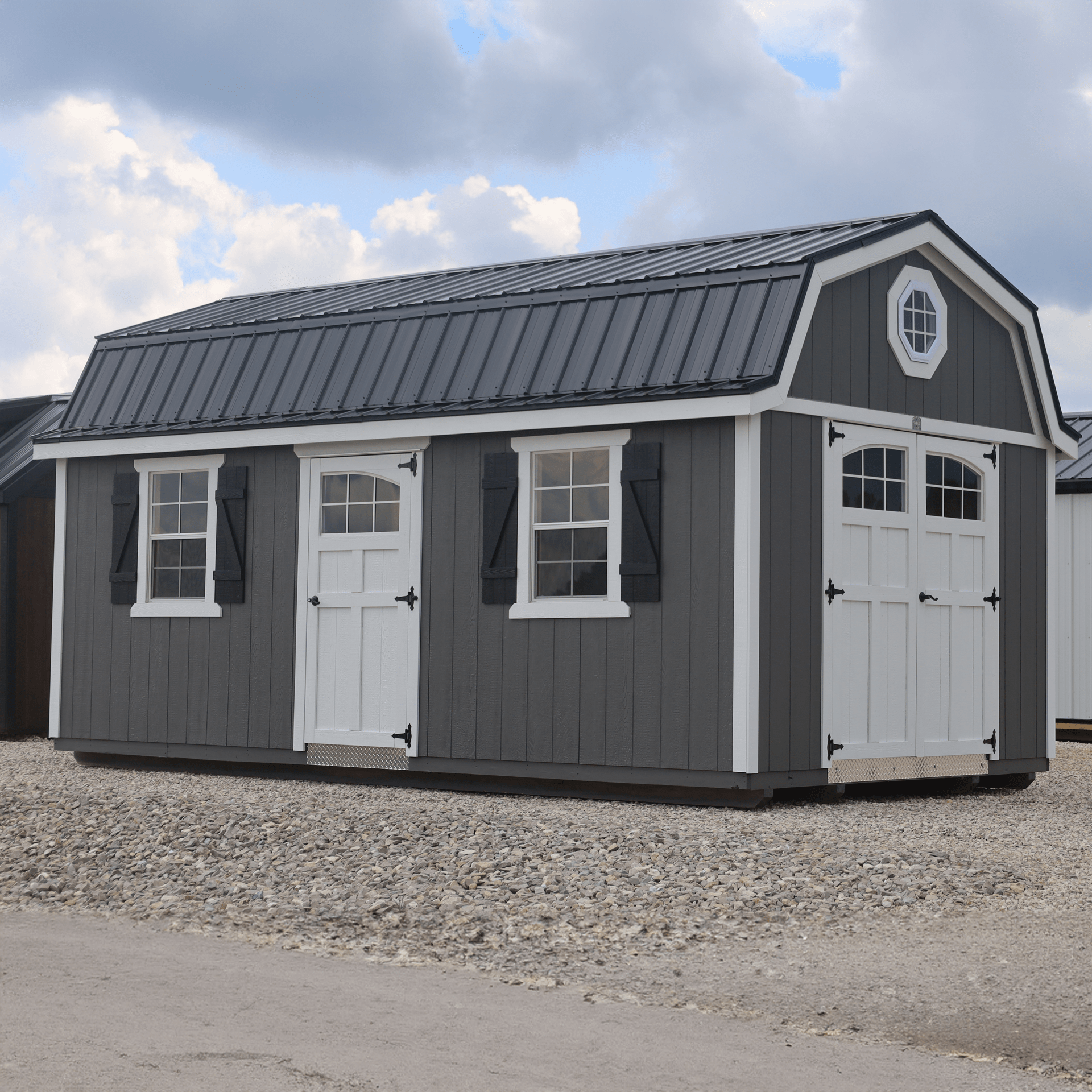 A classic metal shed with white double doors