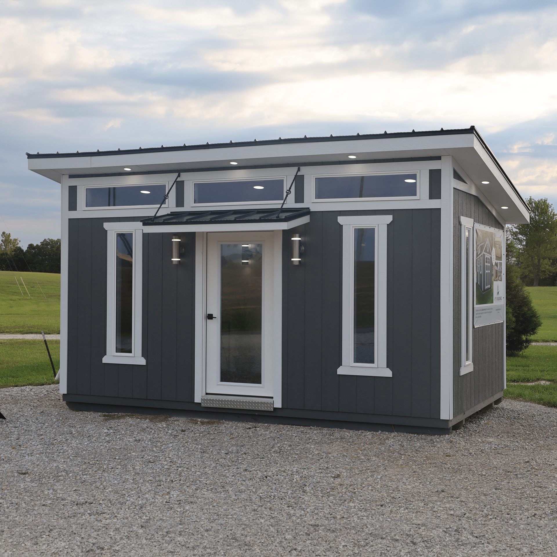 White lofted garage with black trim